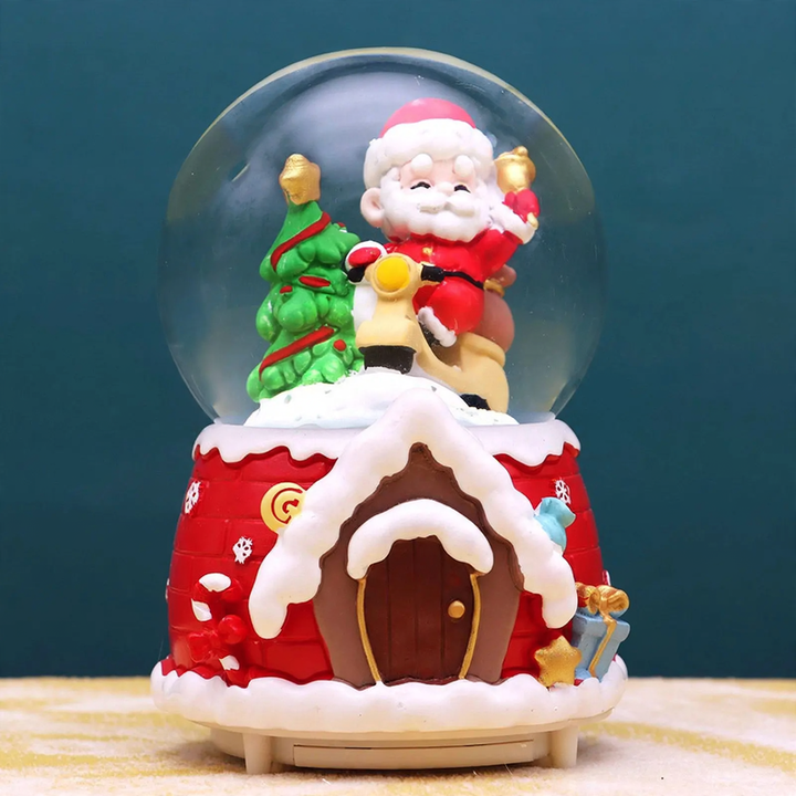Christmas music box with glass sphere and snow effect