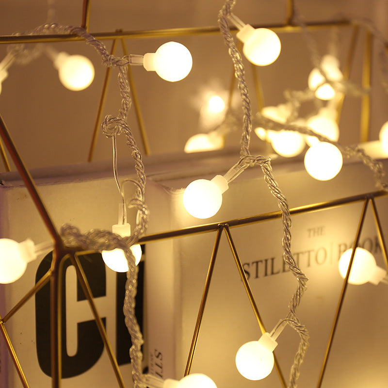 LED string lights with stars and balls for festive decoration
