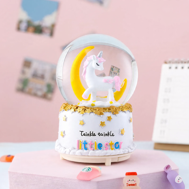 Decorative snow globe with music box