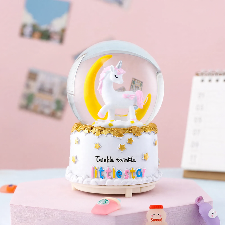 Decorative snow globe with music box