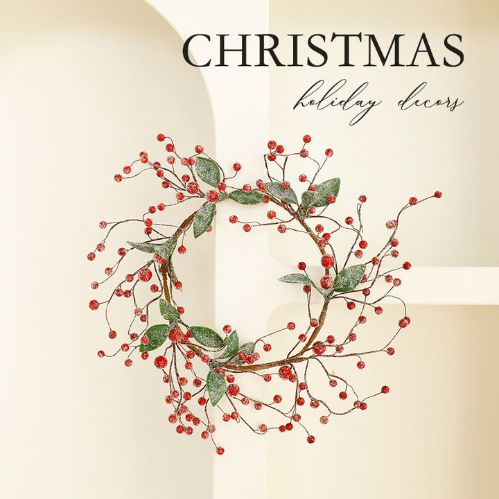 Christmas wreath with berries and pine needles