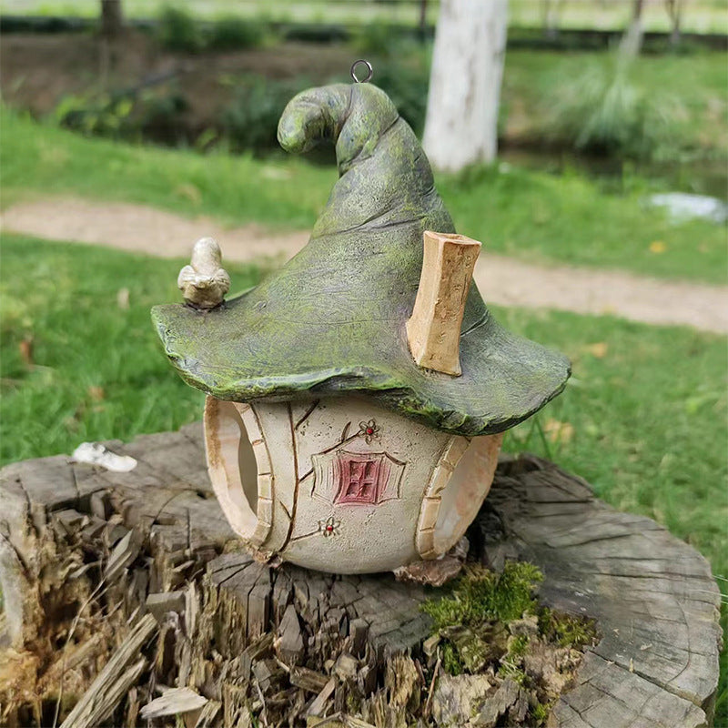 Birdhouse with wizard hat design made of resin