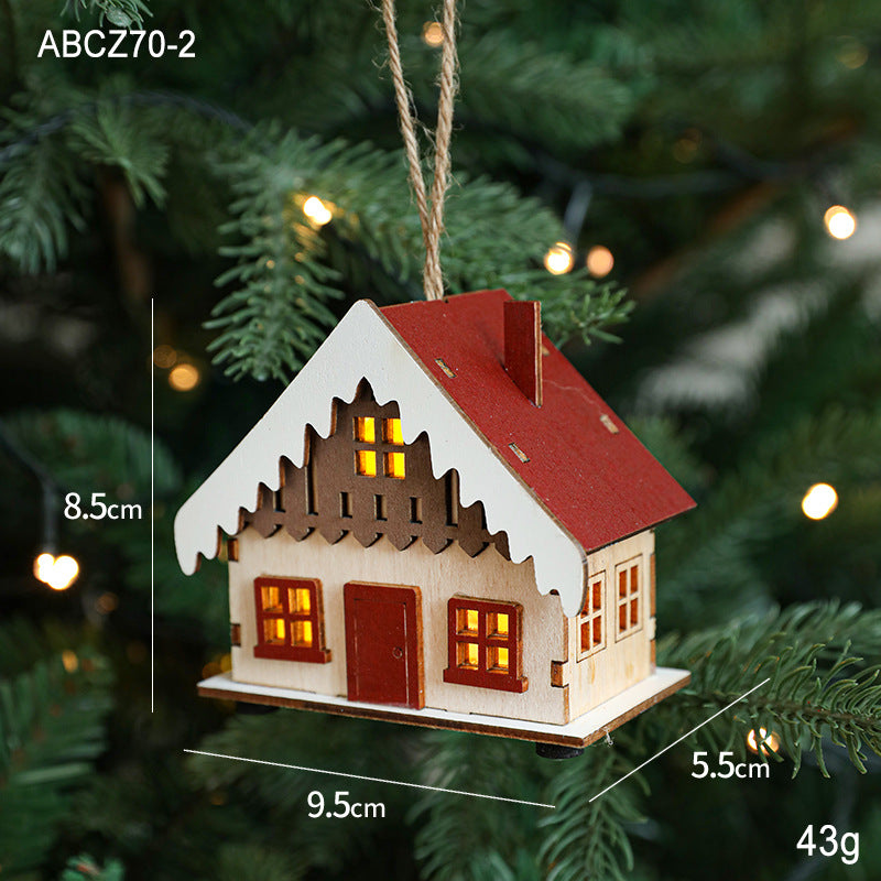 Illuminated wooden house for Christmas decoration