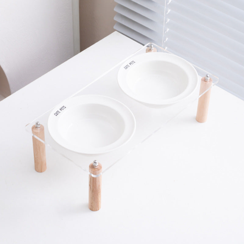 Ceramic double bowl with elevated stand