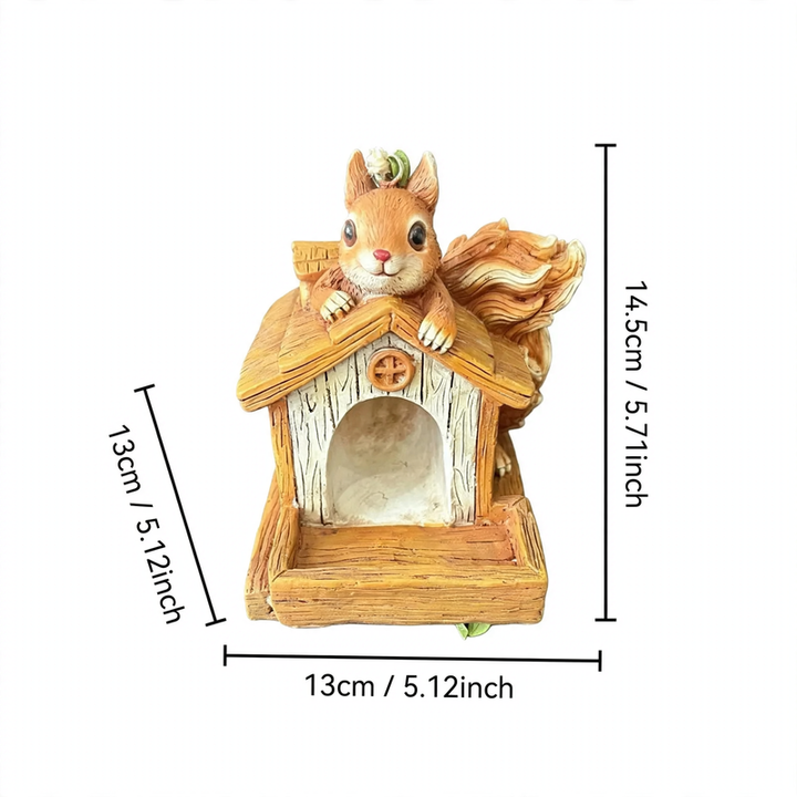 Decorative birdhouse in stump tree look made of resin