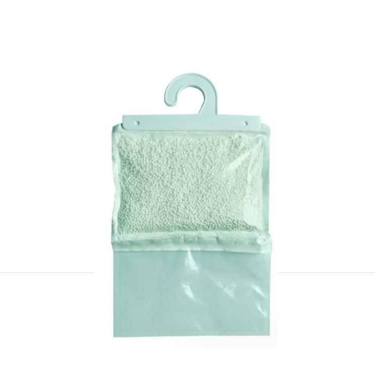 Hanging dehumidifying bag against moisture