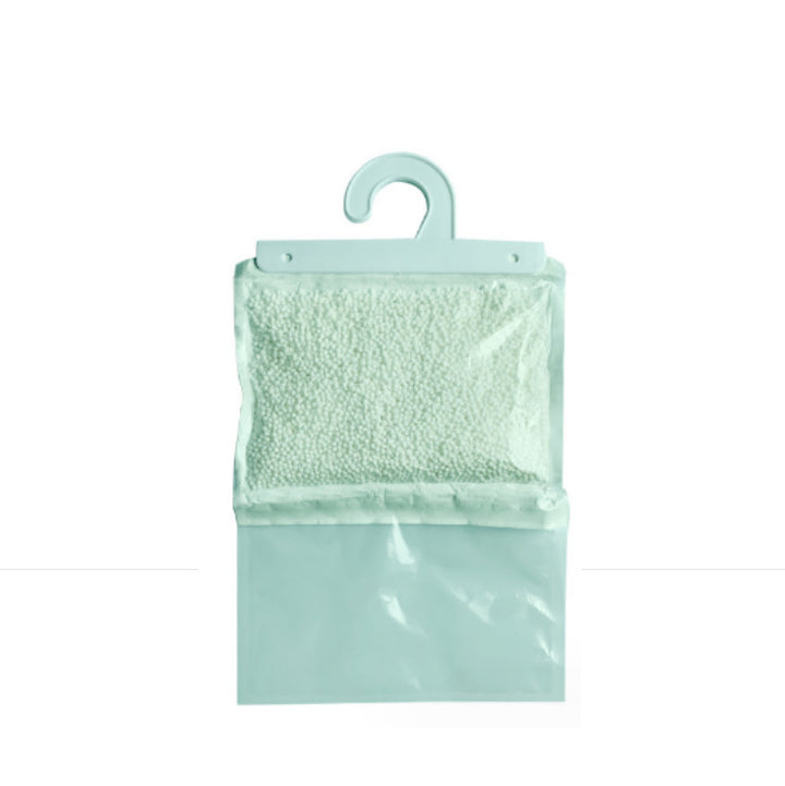 Hanging dehumidifying bag against moisture