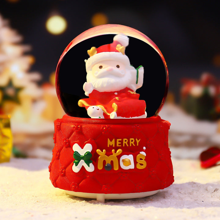 Christmas music box with glass sphere and snow effect