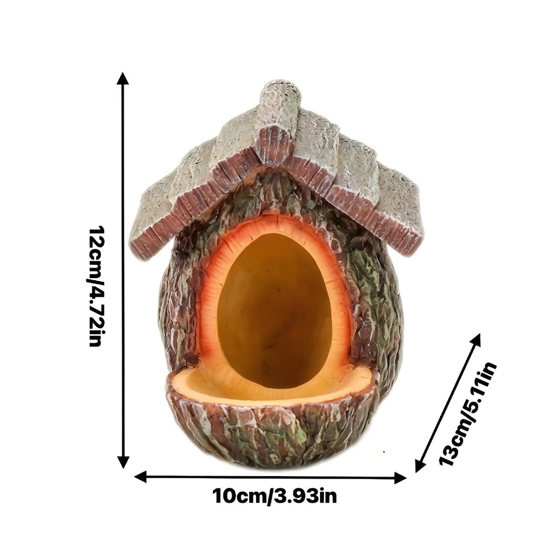 Decorative birdhouse in stump tree look made of resin