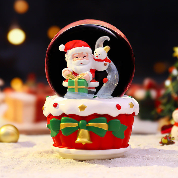 Christmas music box with glass sphere and snow effect