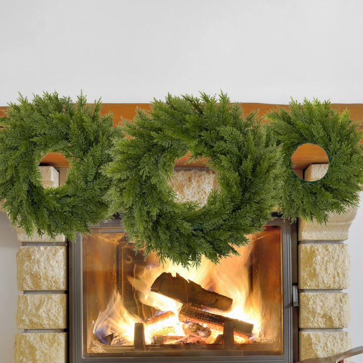 Artificial Christmas wreath with fir needles and berries