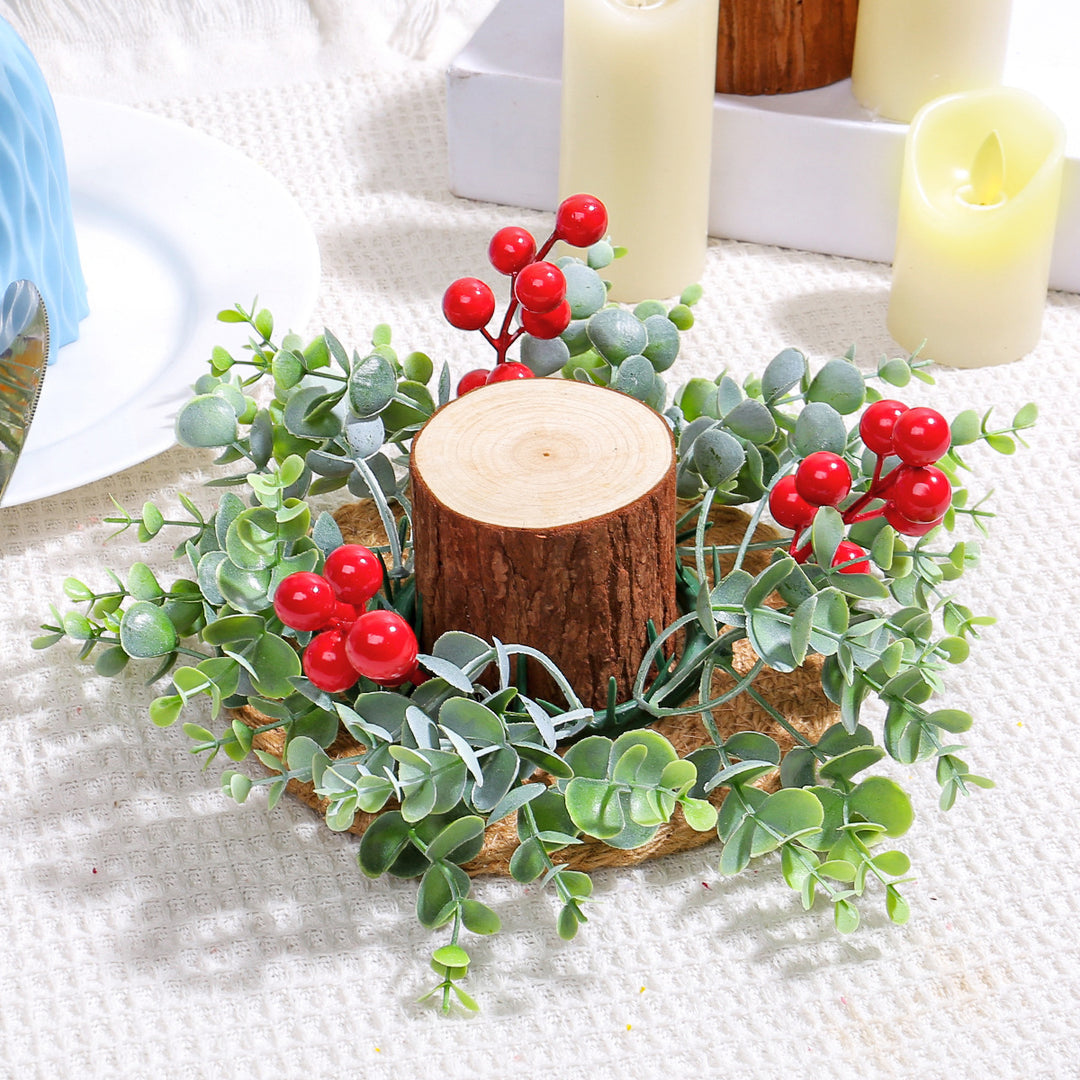 Christmas candle wreath with red berries