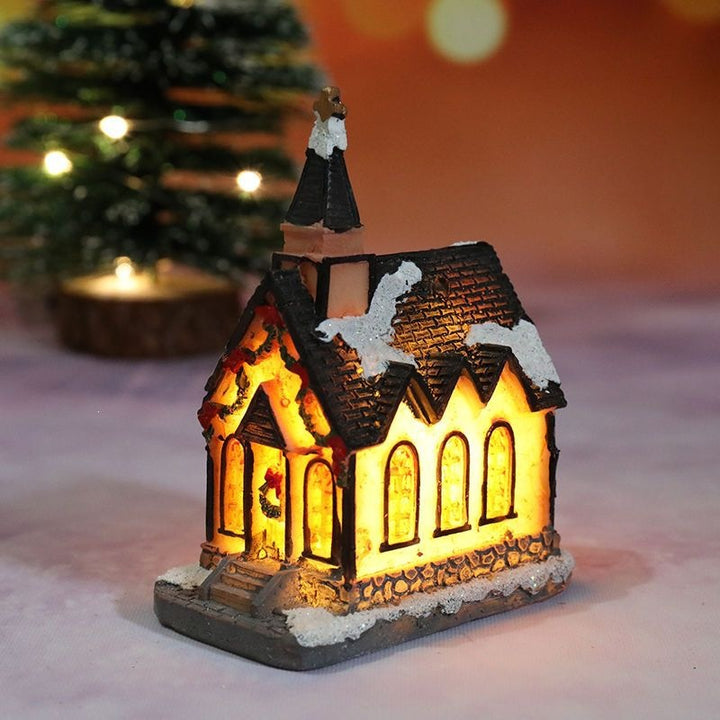 Illuminated Christmas house made of resin