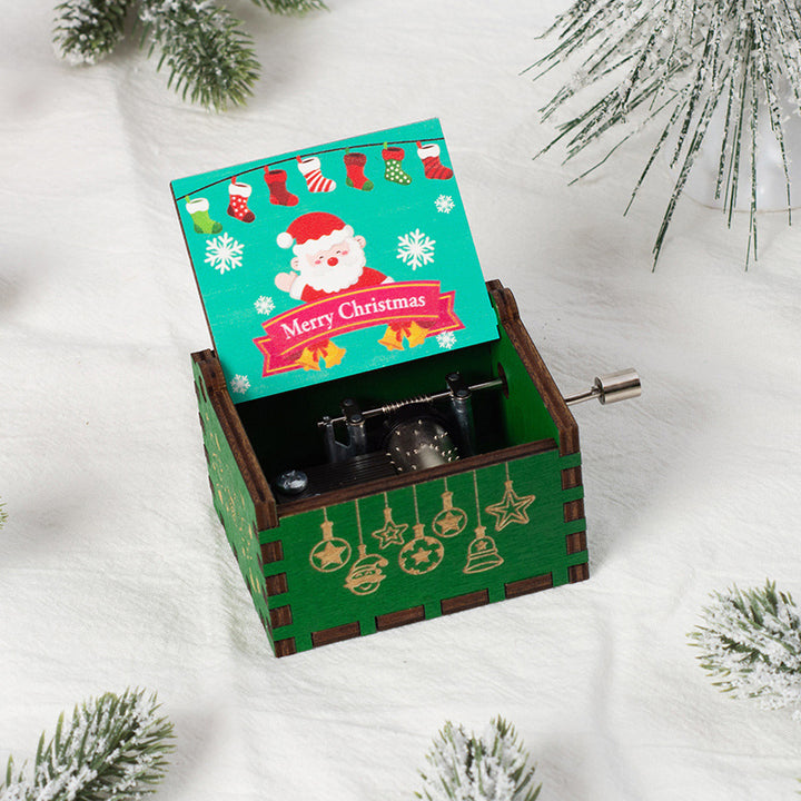 Manual wooden music box with crank