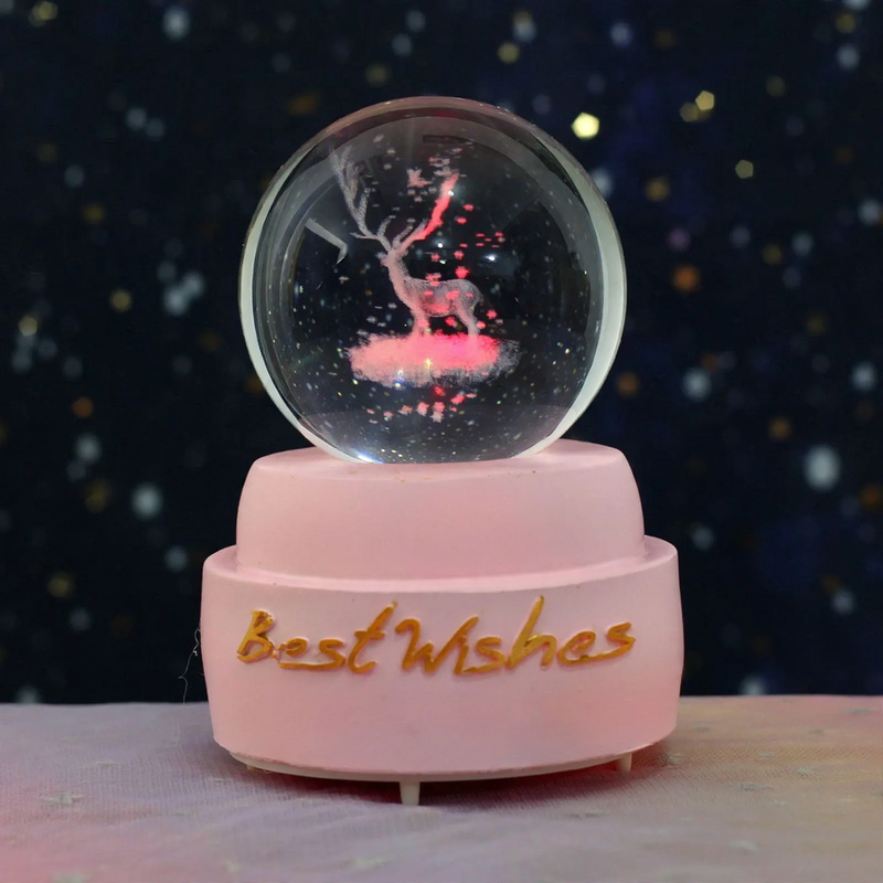 Christmas music box with snow globe and light