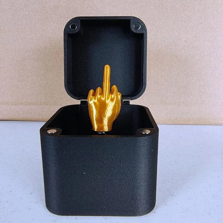 Middle finger in a box | Stornfield