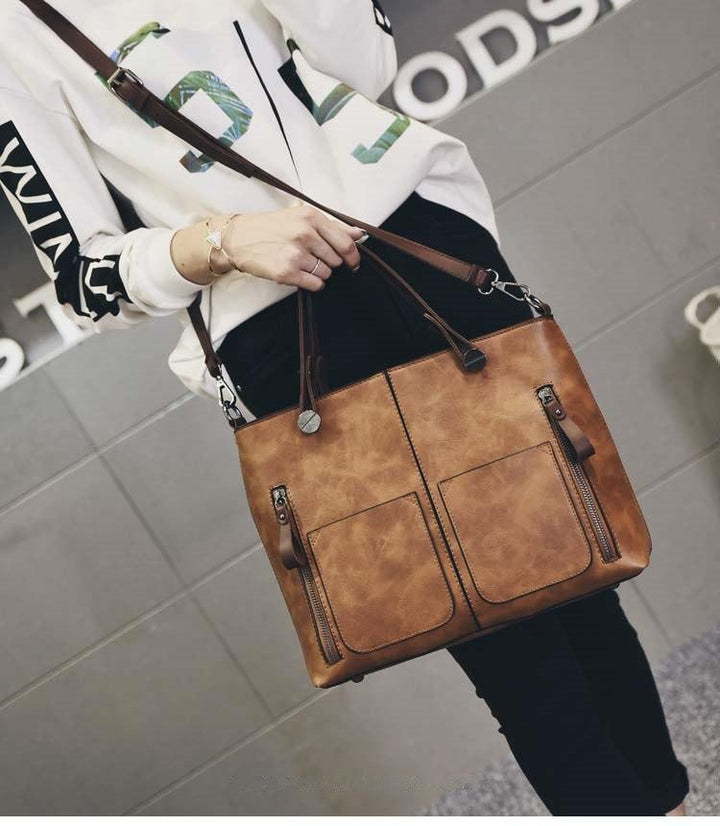 Cera - Vintage handbag with double front pocket | Stornfield