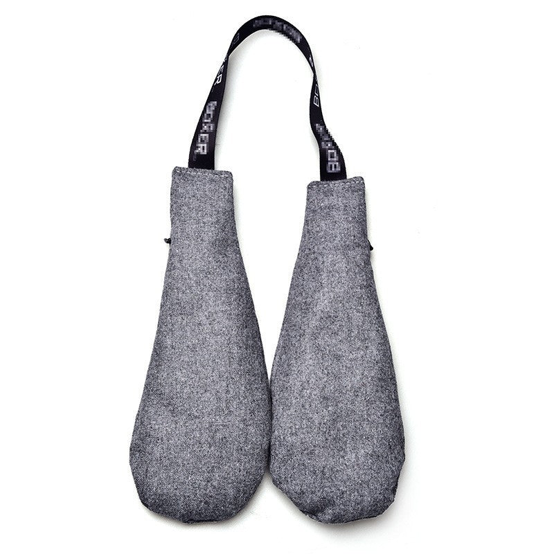 Activated carbon moisture absorber for shoes and sports equipment