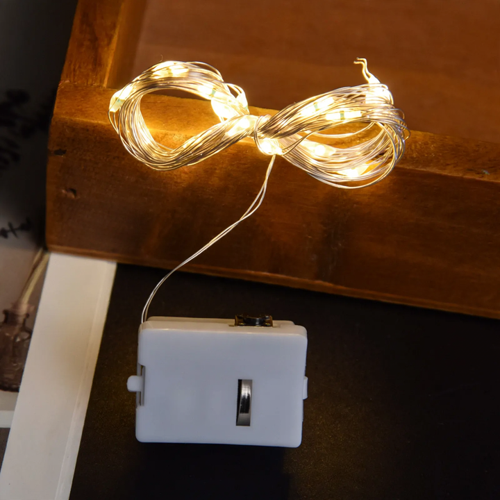 Compact LED string lights with battery operation