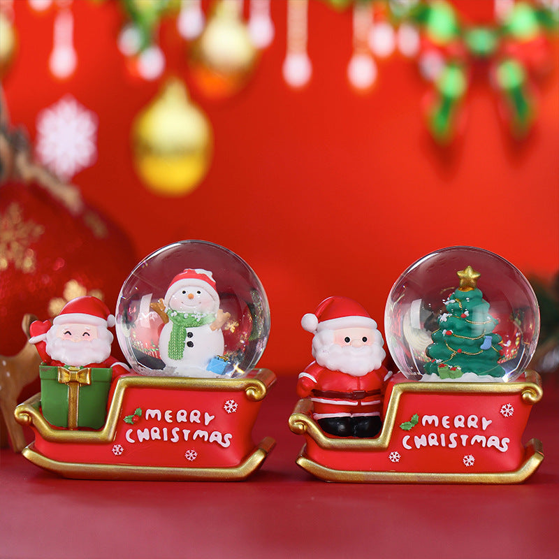 Glowing snow globe with Christmas motifs