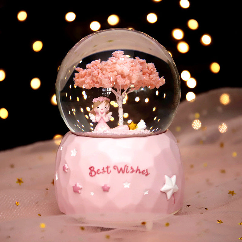 Music box snow globe with light and music