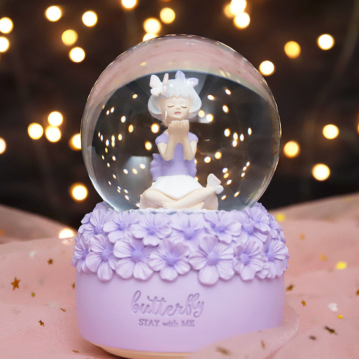 Music box snow globe with light and music