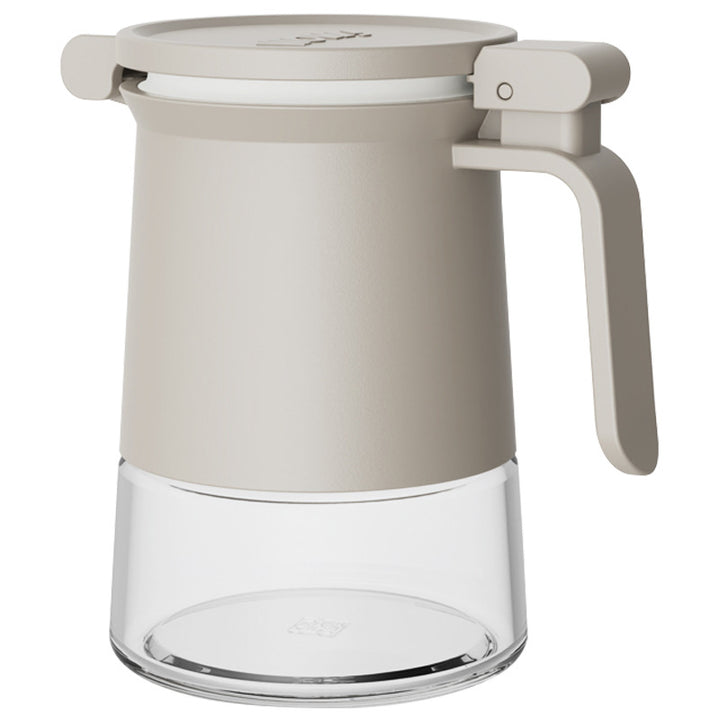 Sealed spice container made of glass with spoon