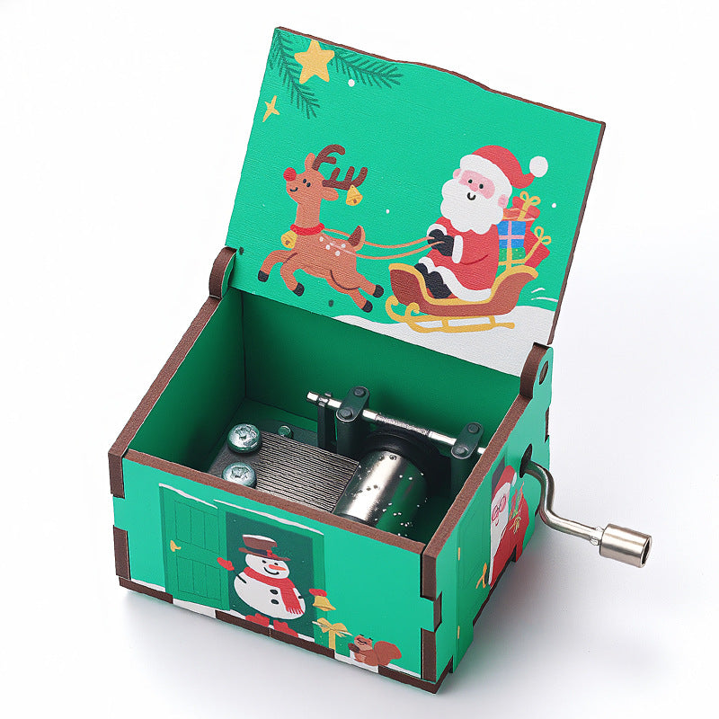 Wooden music box with Christmas motifs, hand-operated