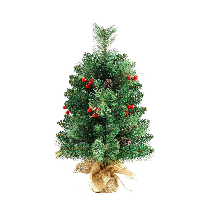Mini Christmas tree with pine cones and berries