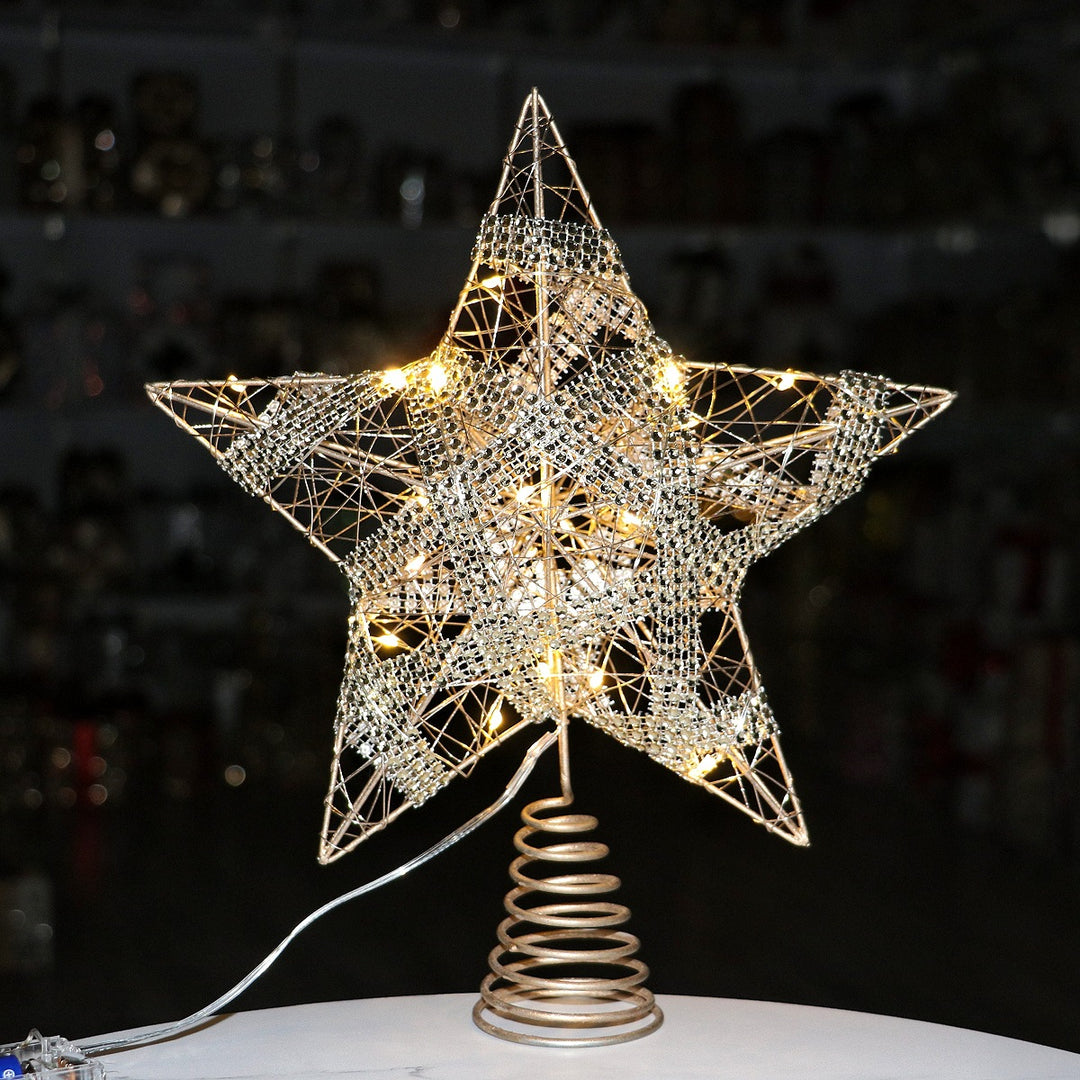 Christmas tree top star made of iron, illuminated
