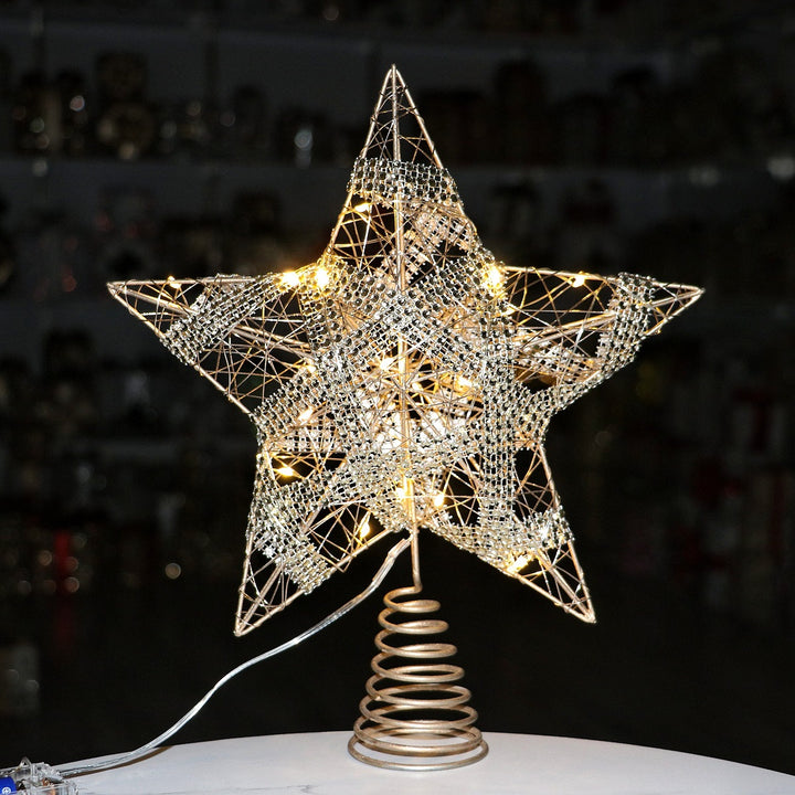 Christmas tree top star made of iron, illuminated