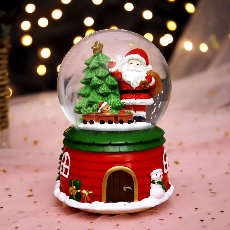 Christmas music box with snow globe and light