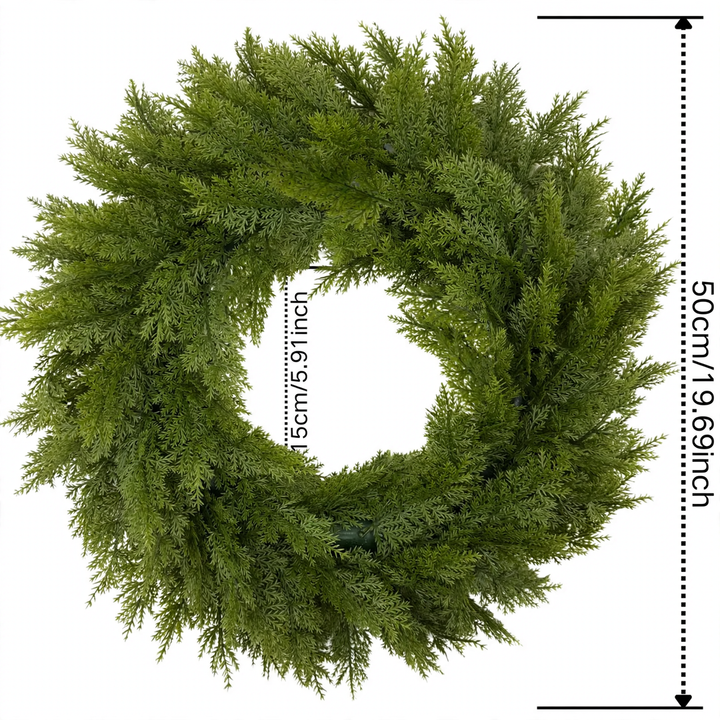 Artificial Christmas wreath with fir needles and berries