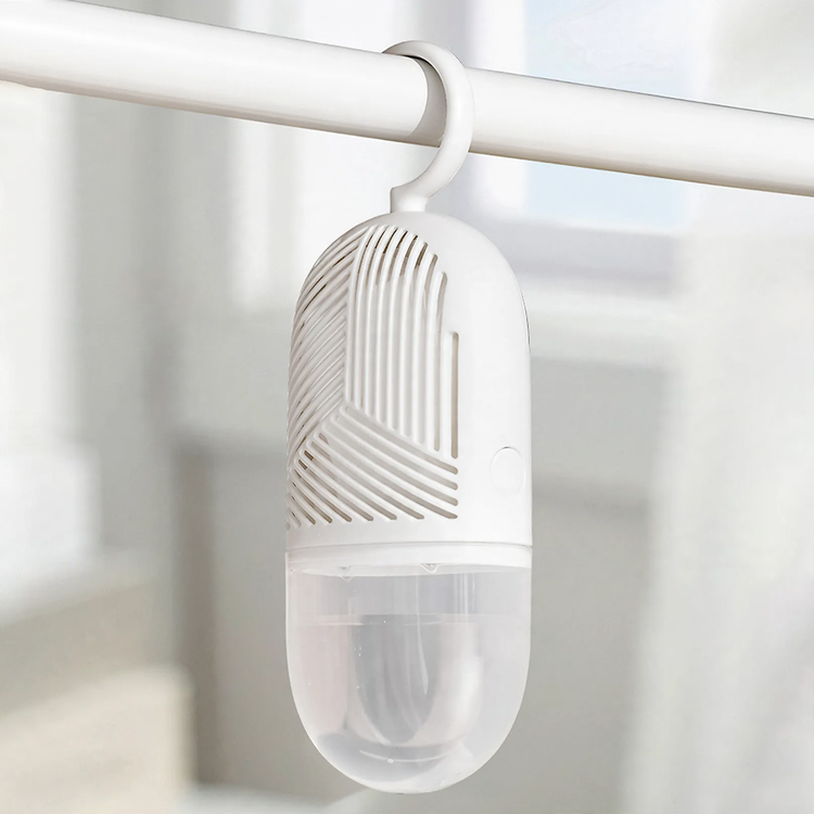 Hanging dehumidifier box for wardrobes