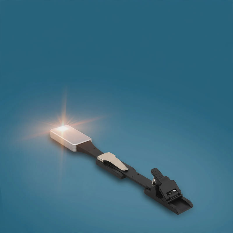 Mini clamp light for books and bookmarks