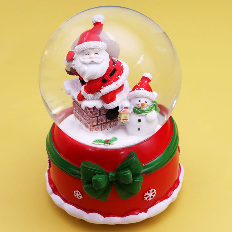 Christmas music box with light and snow globe