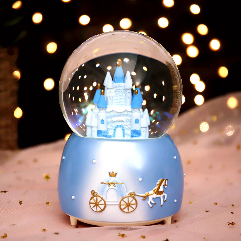Fairy-tale snow globe with music and light