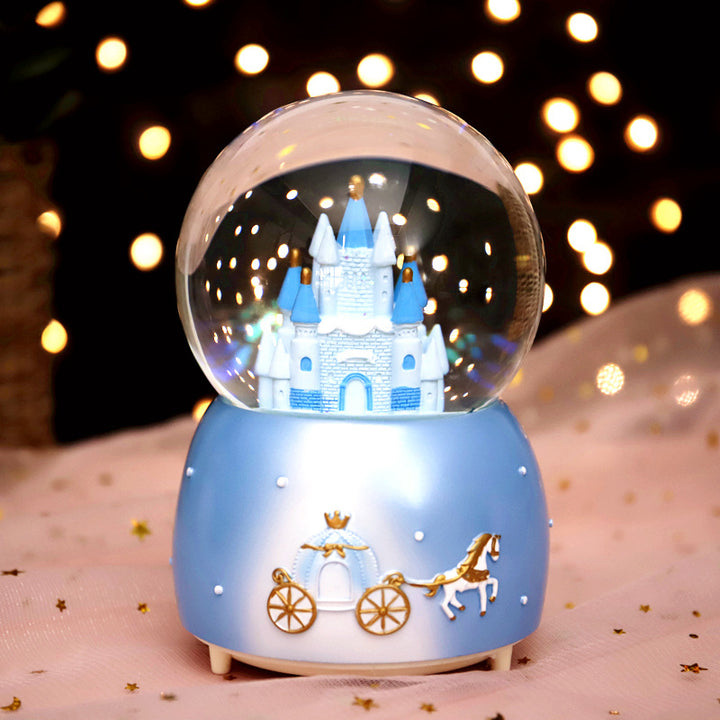 Fairy-tale snow globe with music and light