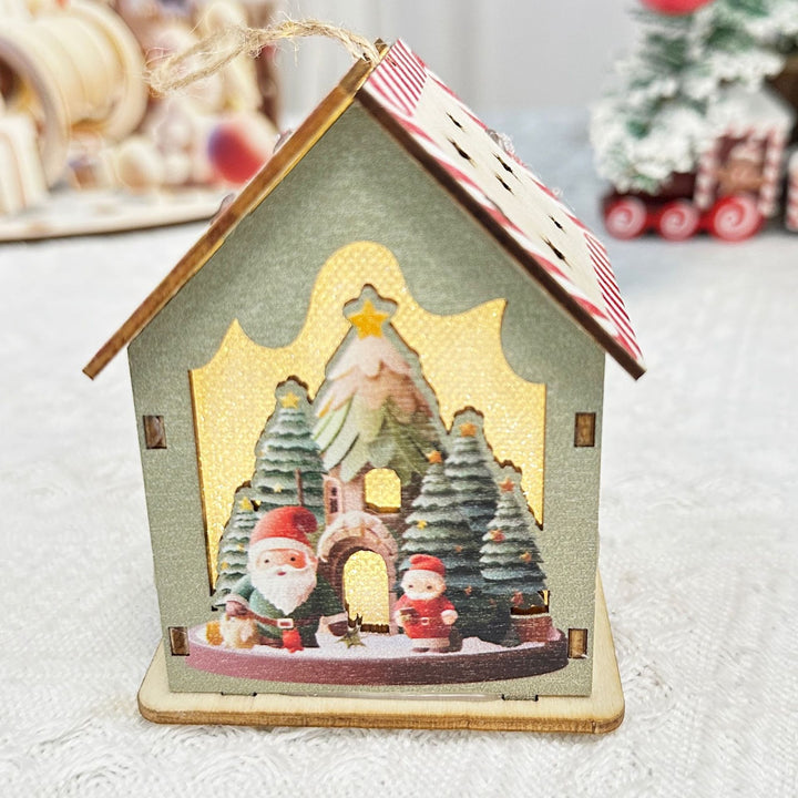 Illuminated wooden house for festive table decoration