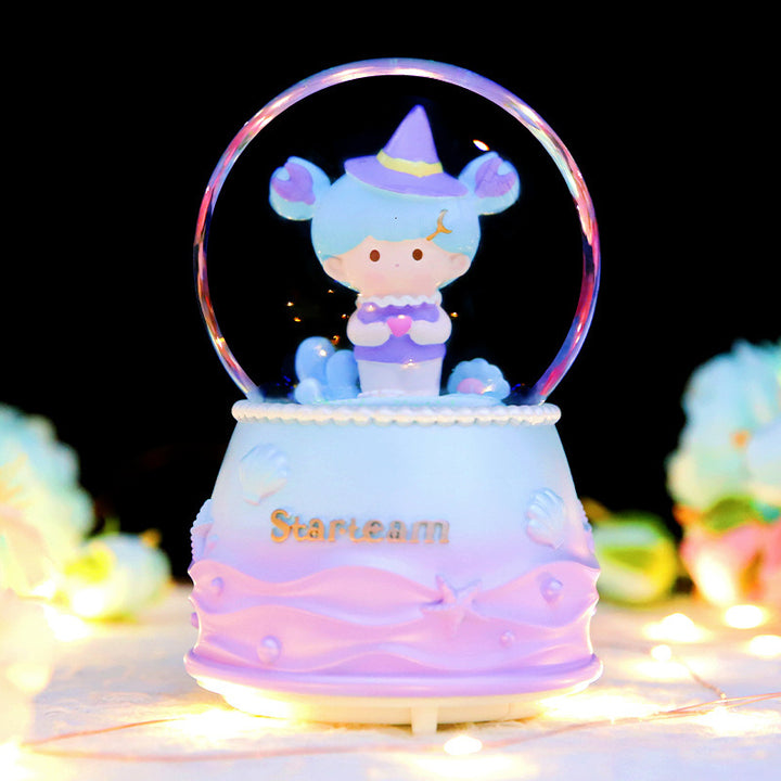 Music box snow globe with light and music