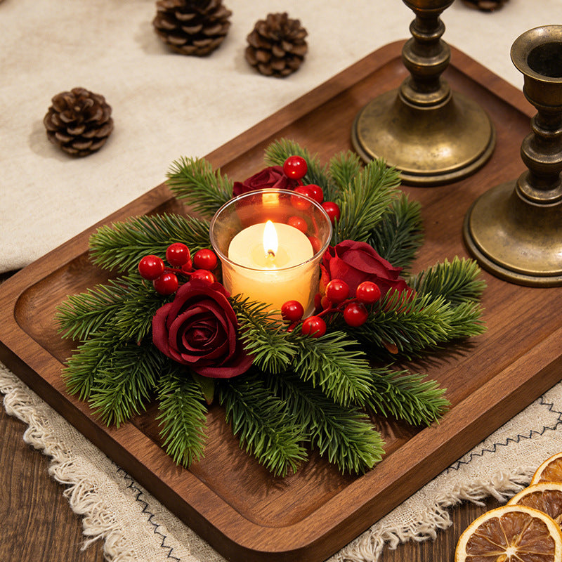 Christmas candle wreath with pine needles and berries