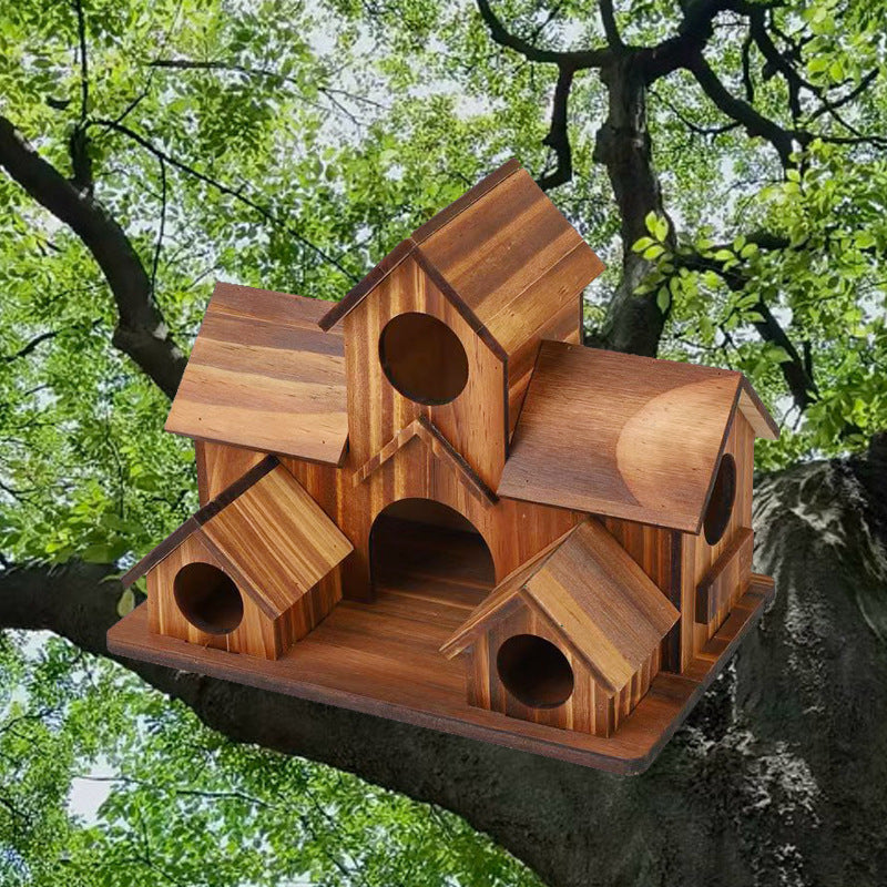 Birdhouse in villa style made of wood