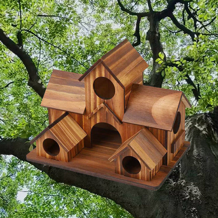 Birdhouse in villa style made of wood