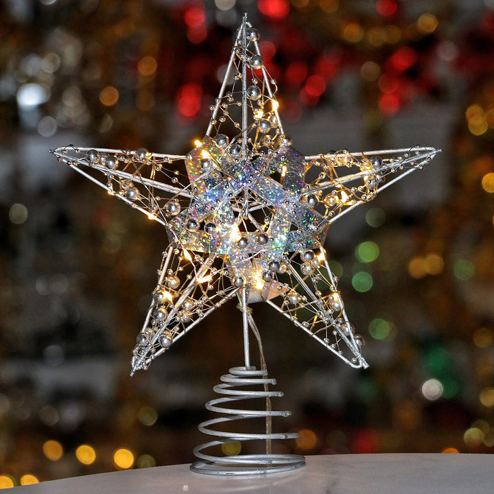 Christmas tree star top made of iron, illuminated
