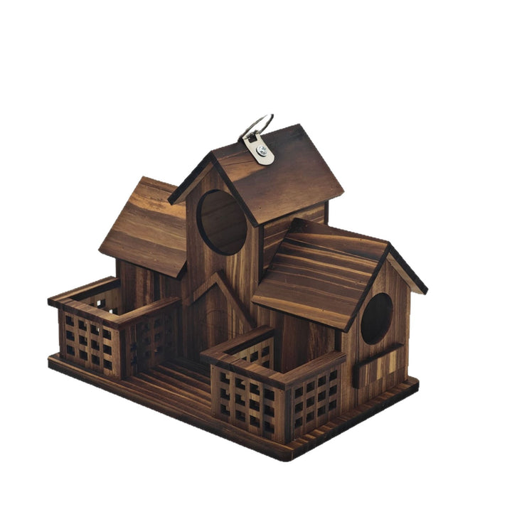 Birdhouse made of pine wood with feeding station