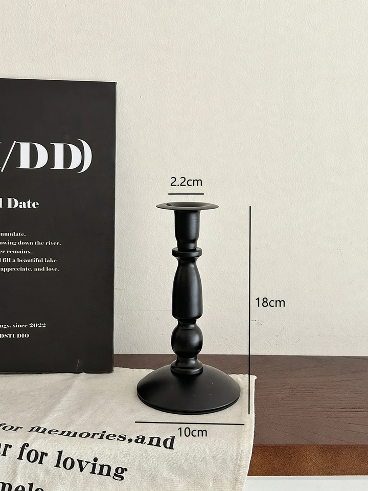 Decorative candle holder made of glass and wood