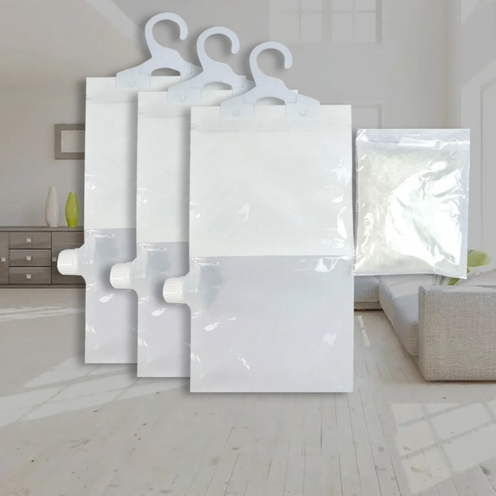 Hanging dehumidifying bag against moisture