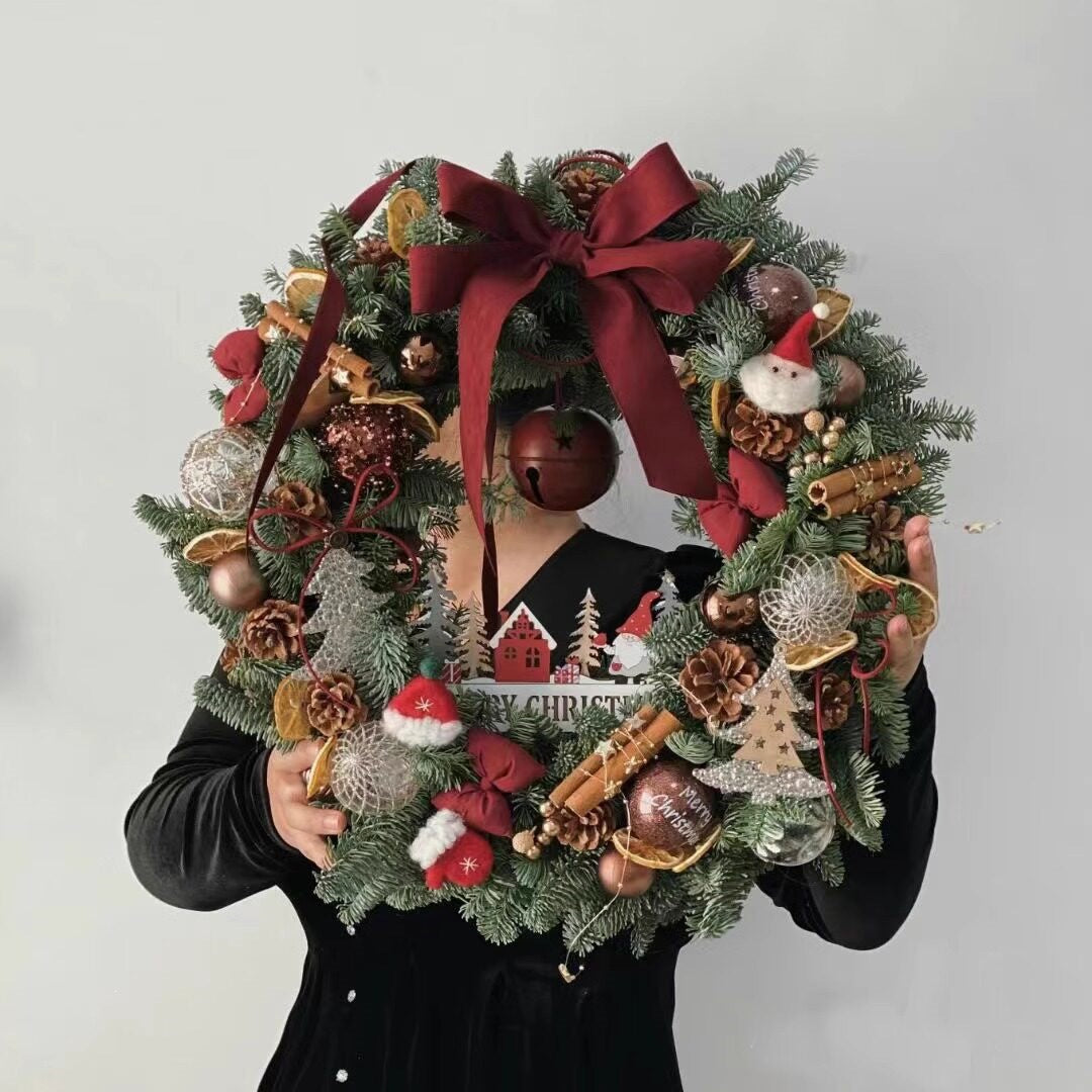 Decorative Christmas wreath made of silk flowers
