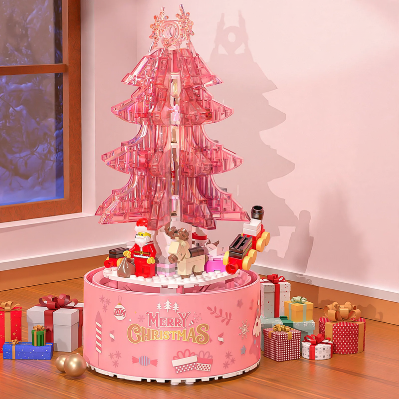 Rotating music box with light and snowfall