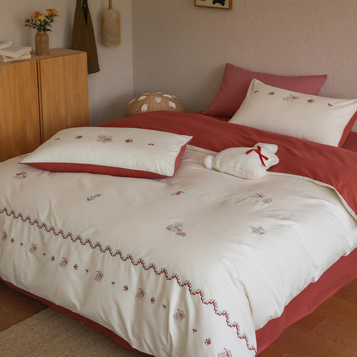 Elegant cotton bedding set with embroidery and bows